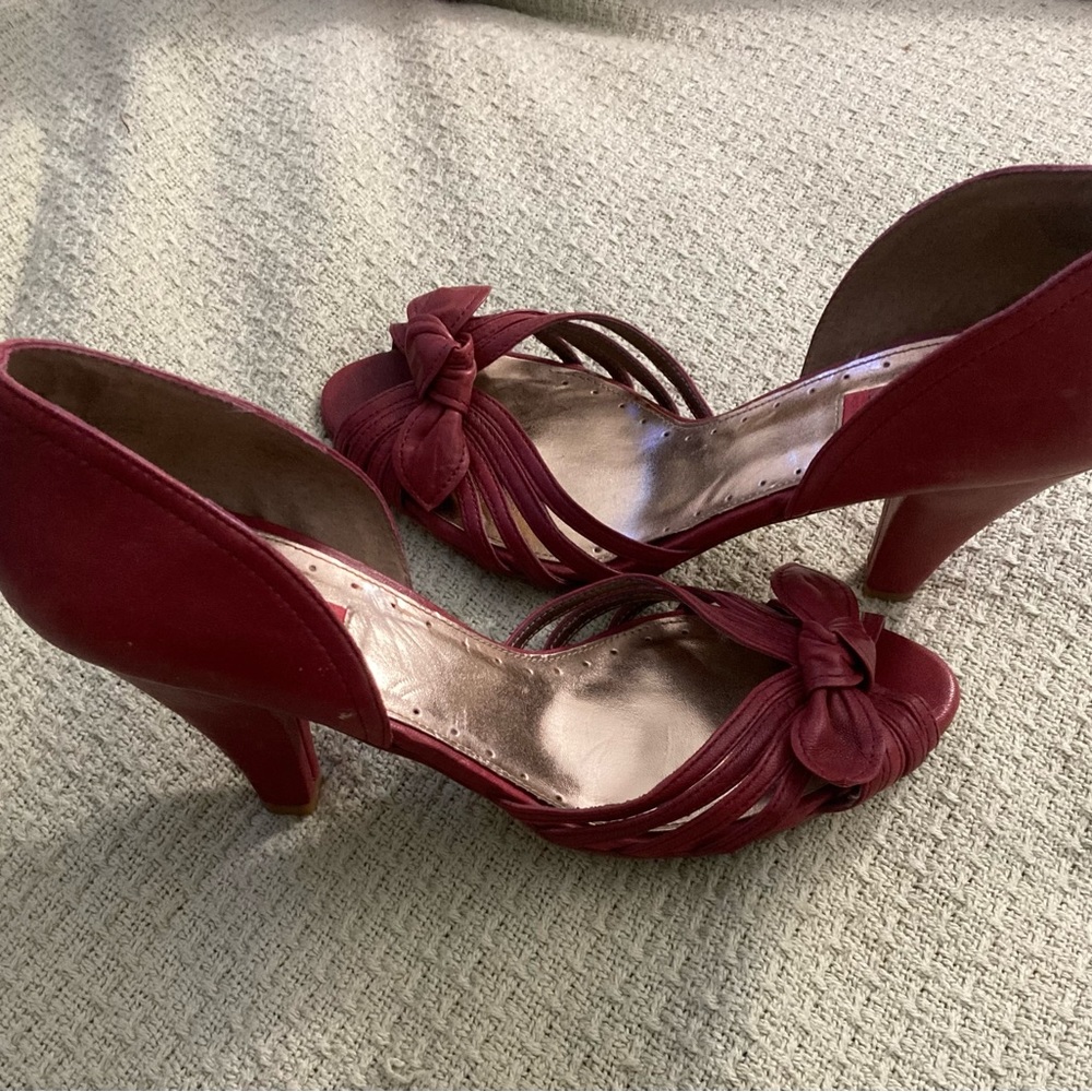 Gently worn open toe pumps. Cross between red and hot pink. 3 1/2 inch heel